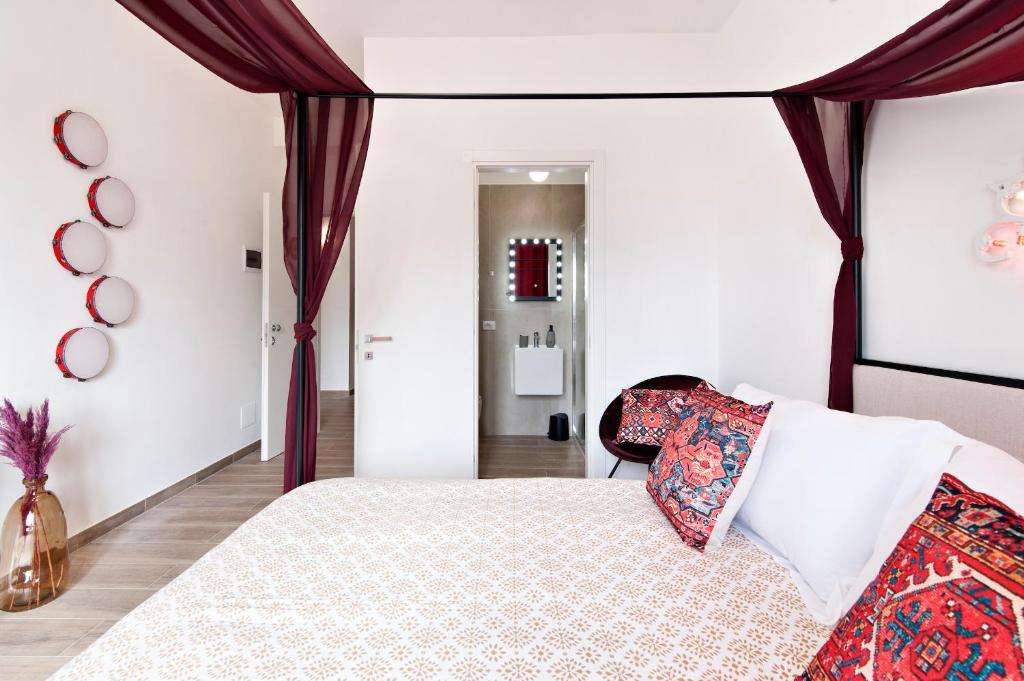 Postel nebo postele na pokoji v ubytování 7Rooms - Lecce Selection