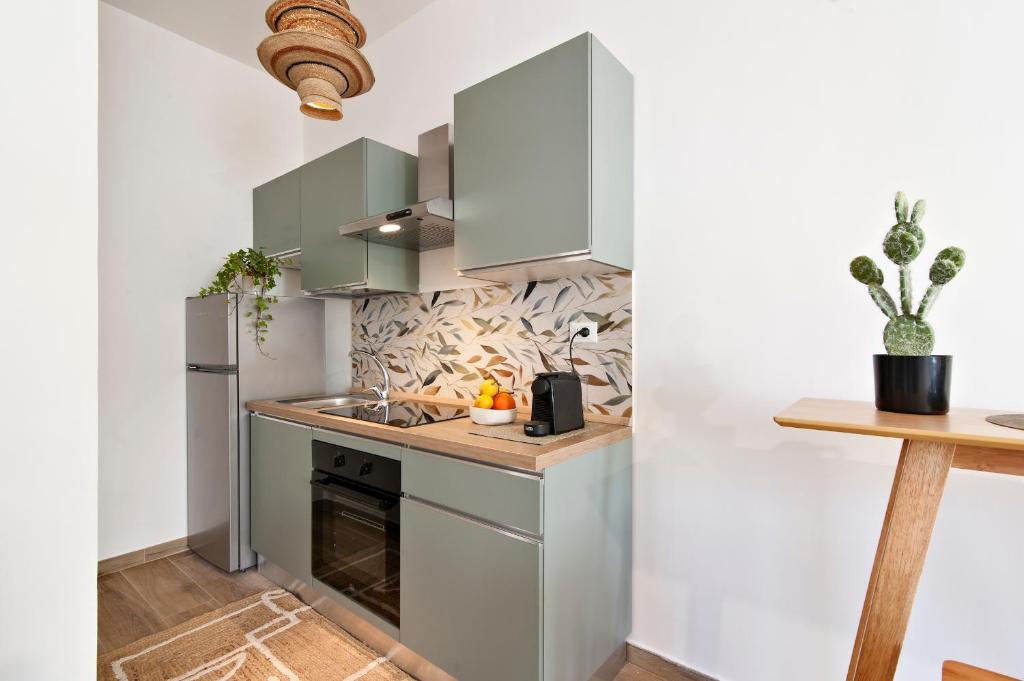 Kuchyň nebo kuchyňský kout v ubytování 7Rooms - Lecce Selection