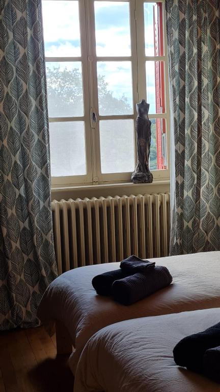 Posteľ alebo postele v izbe v ubytovaní Maison La vie de l'Aubrac - Gîte Lo Bel Peis