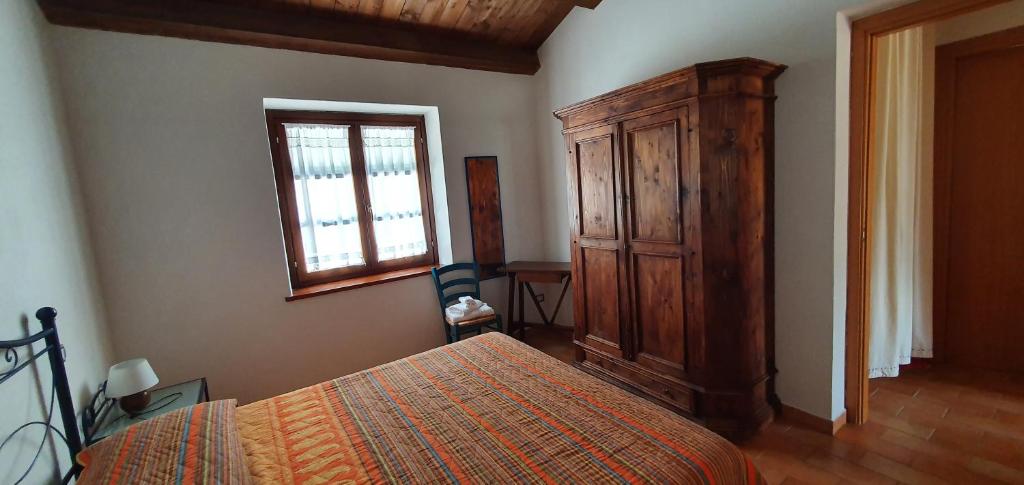 Postel nebo postele na pokoji v ubytování Il Vigneto