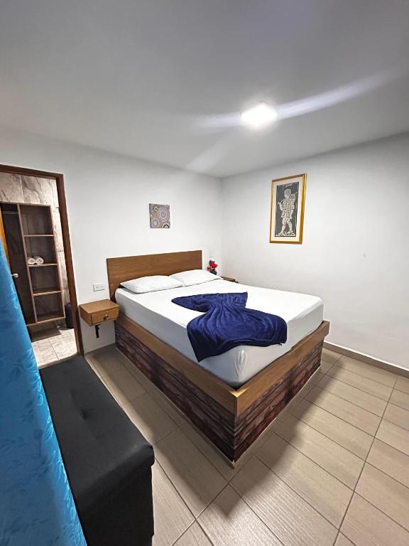 Postel nebo postele na pokoji v ubytování Hotel Olímpica