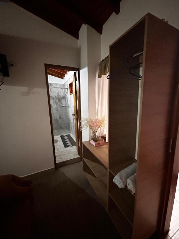 Postel nebo postele na pokoji v ubytování Hotel Olímpica
