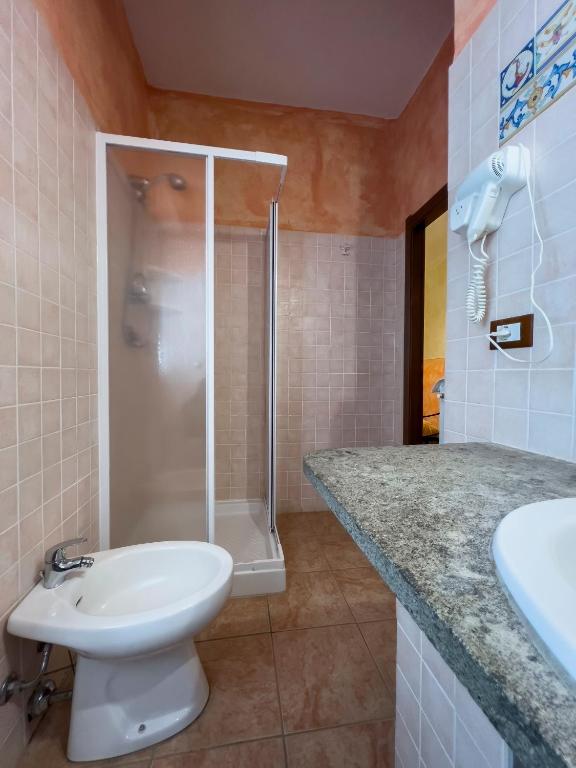Koupelna v ubytování Bio Agriturismo Aia del Tufo
