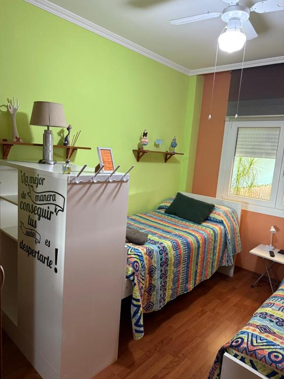 A bed or beds in a room at Tximeleta Bidean