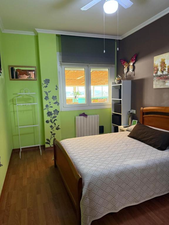 A bed or beds in a room at Tximeleta Bidean