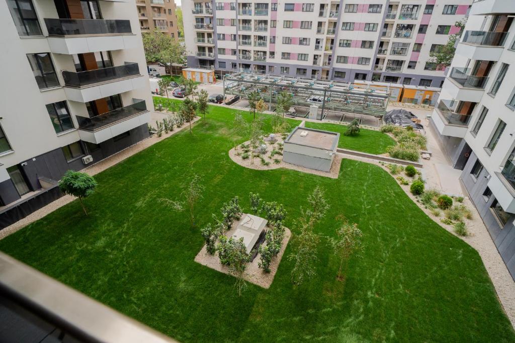 Photo inspiration: High End Apartments With Modern Amenities Near Parks Reference: High End Apartments In Politehnica Park Iuliu Maniu 6R