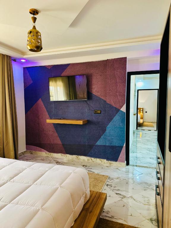 Postel nebo postele na pokoji v ubytování DAKHLA RELAX étage03