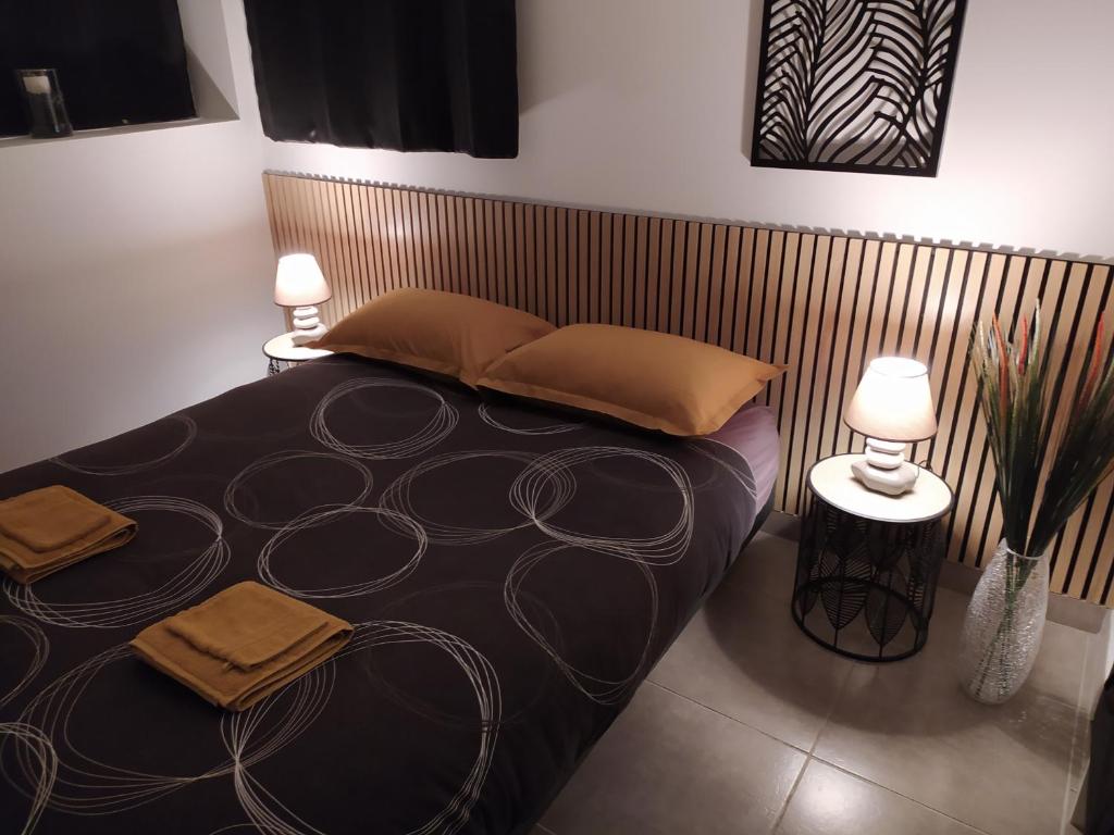 Postel nebo postele na pokoji v ubytování charmant gite 25m² indépendant
