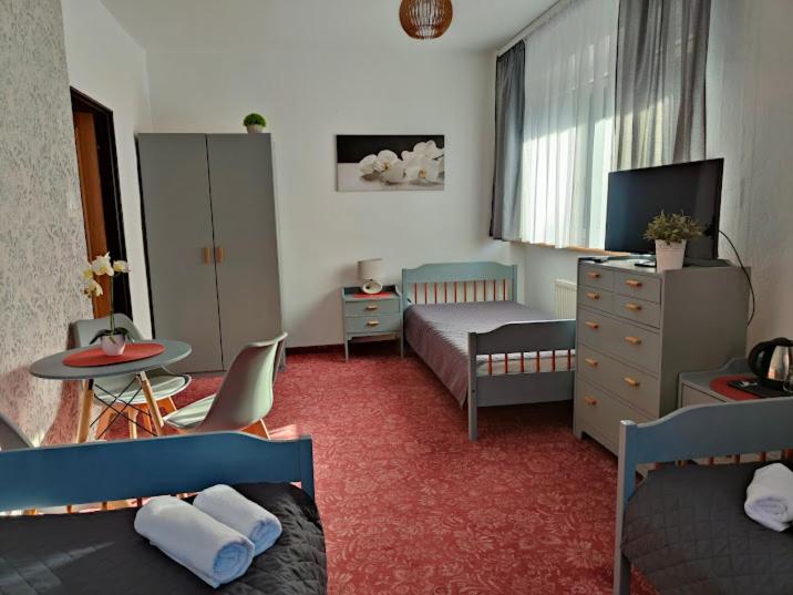 Postel nebo postele na pokoji v ubytování DW Agat