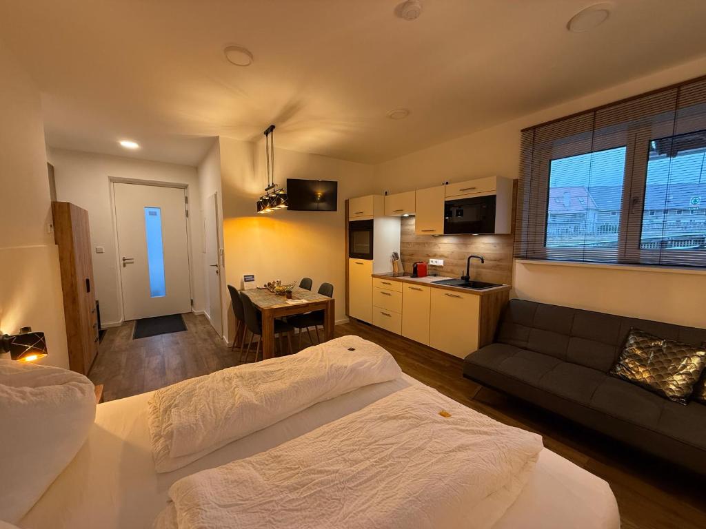 Postel nebo postele na pokoji v ubytování Appartements Stuhleckblick