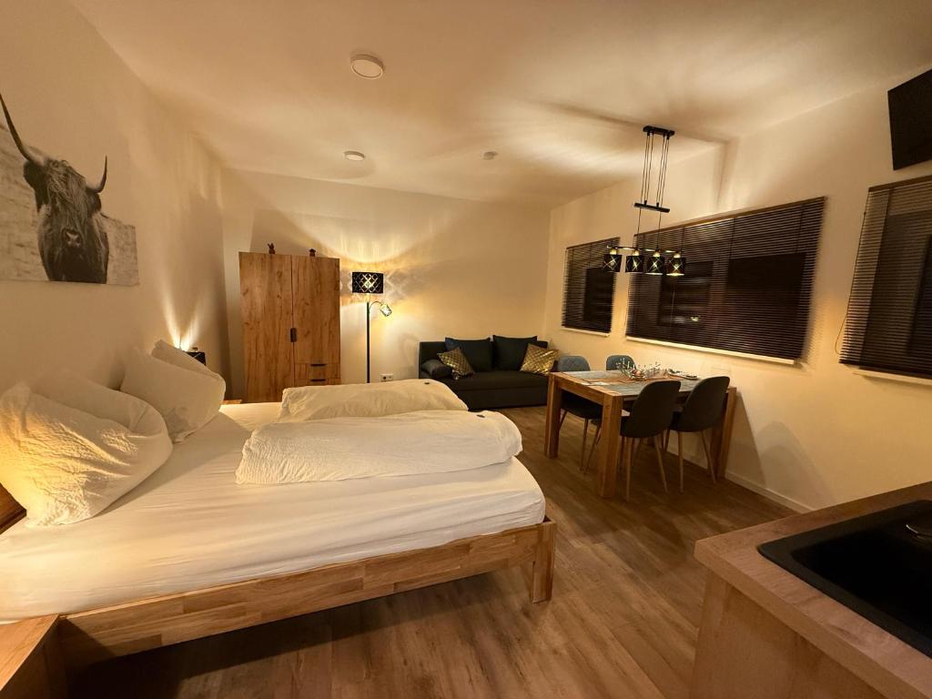 Postel nebo postele na pokoji v ubytování Appartements Stuhleckblick