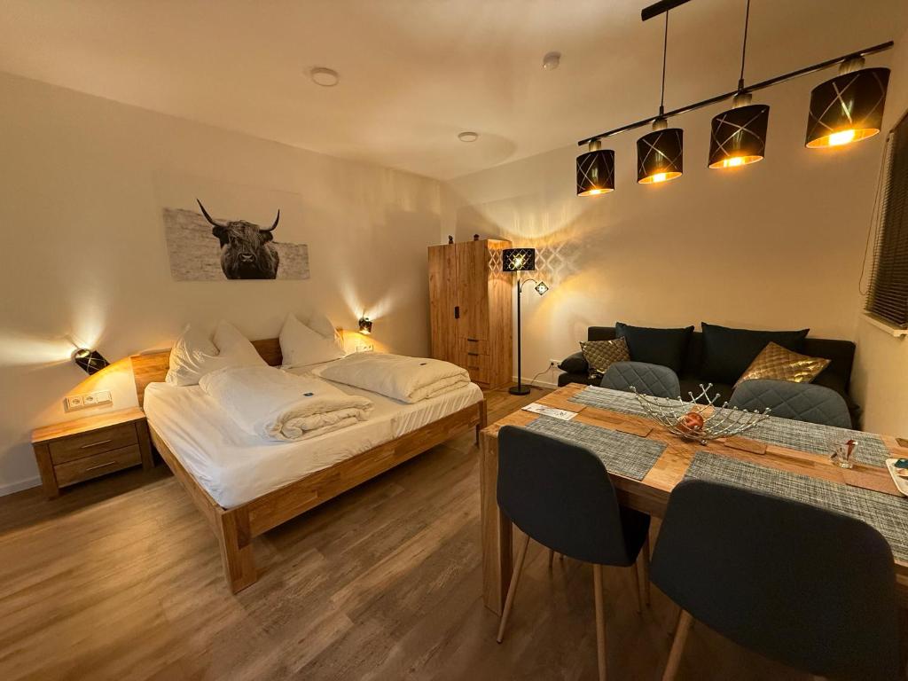 Postel nebo postele na pokoji v ubytování Appartements Stuhleckblick