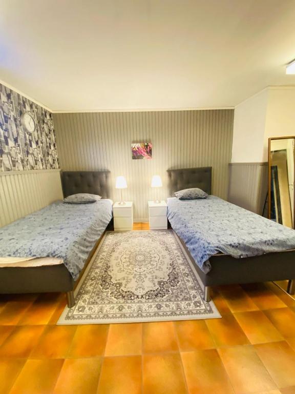 Postel nebo postele na pokoji v ubytování Noah Longstay daggstigen 22