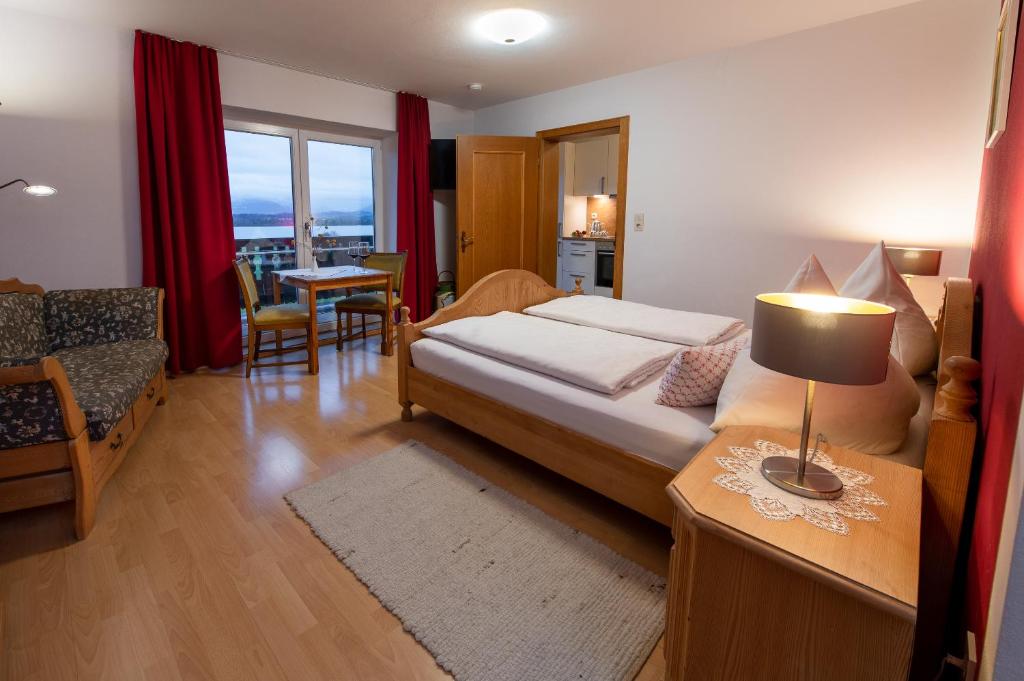 Postel nebo postele na pokoji v ubytování Gästehaus Nigglhof