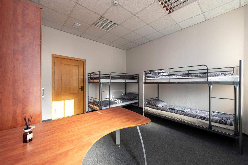 Postel nebo postele na pokoji v ubytování Vilnius Hostel