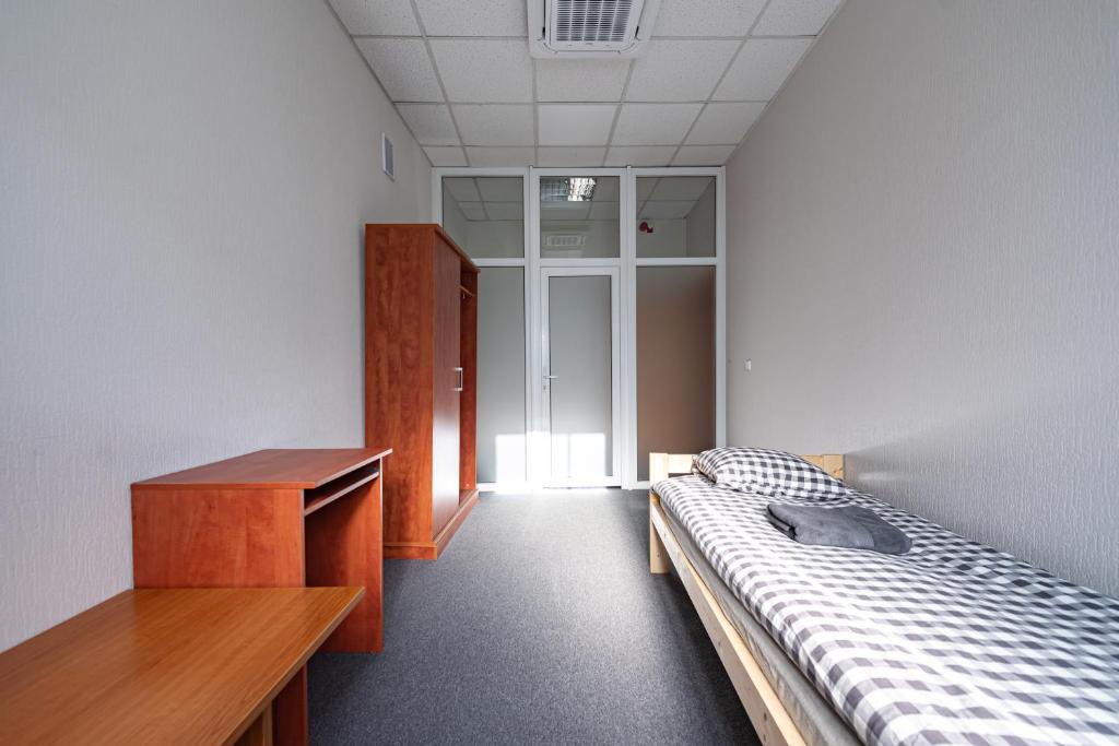 Postel nebo postele na pokoji v ubytování Vilnius Hostel