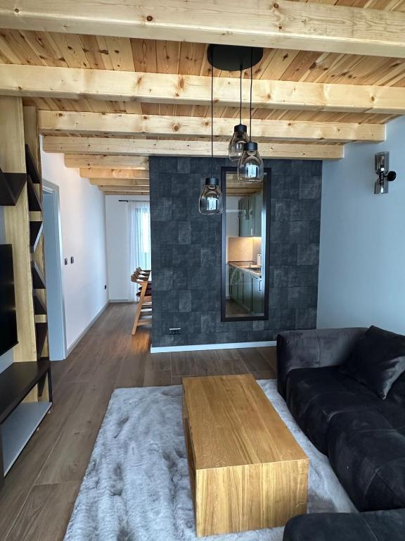Posezení v ubytování Black Chalet