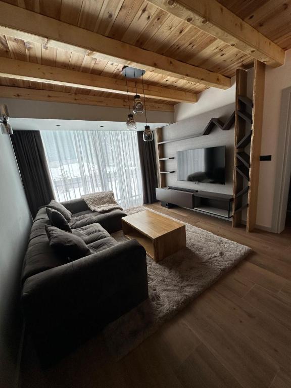 Posezení v ubytování Black Chalet