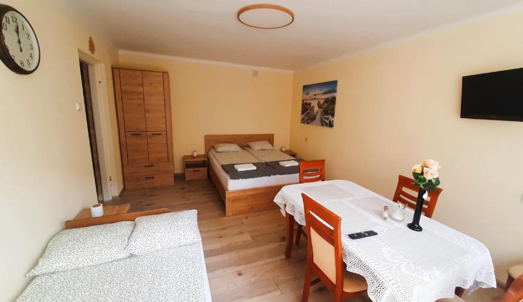 Ένα ή περισσότερα κρεβάτια σε δωμάτιο στο Apartament Sofia
