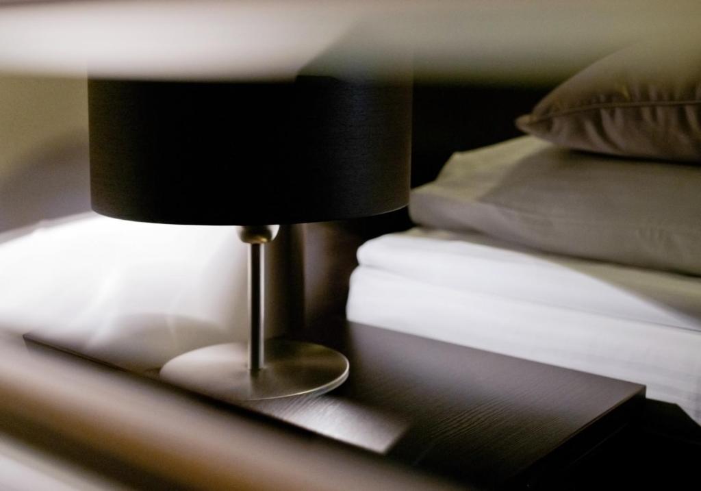 Posteľ alebo postele v izbe v ubytovaní Hotel Capitol