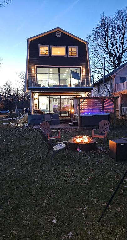 a house with a fire pit in the yard at the bachelorette in North Beach