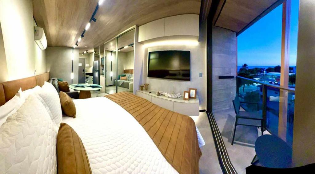 TV a/nebo společenská místnost v ubytování Studio Luxo Maceió New Time 515