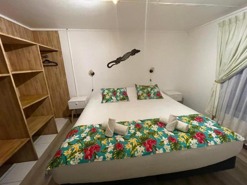 Postel nebo postele na pokoji v ubytování Hotel Hotu Matua by EI