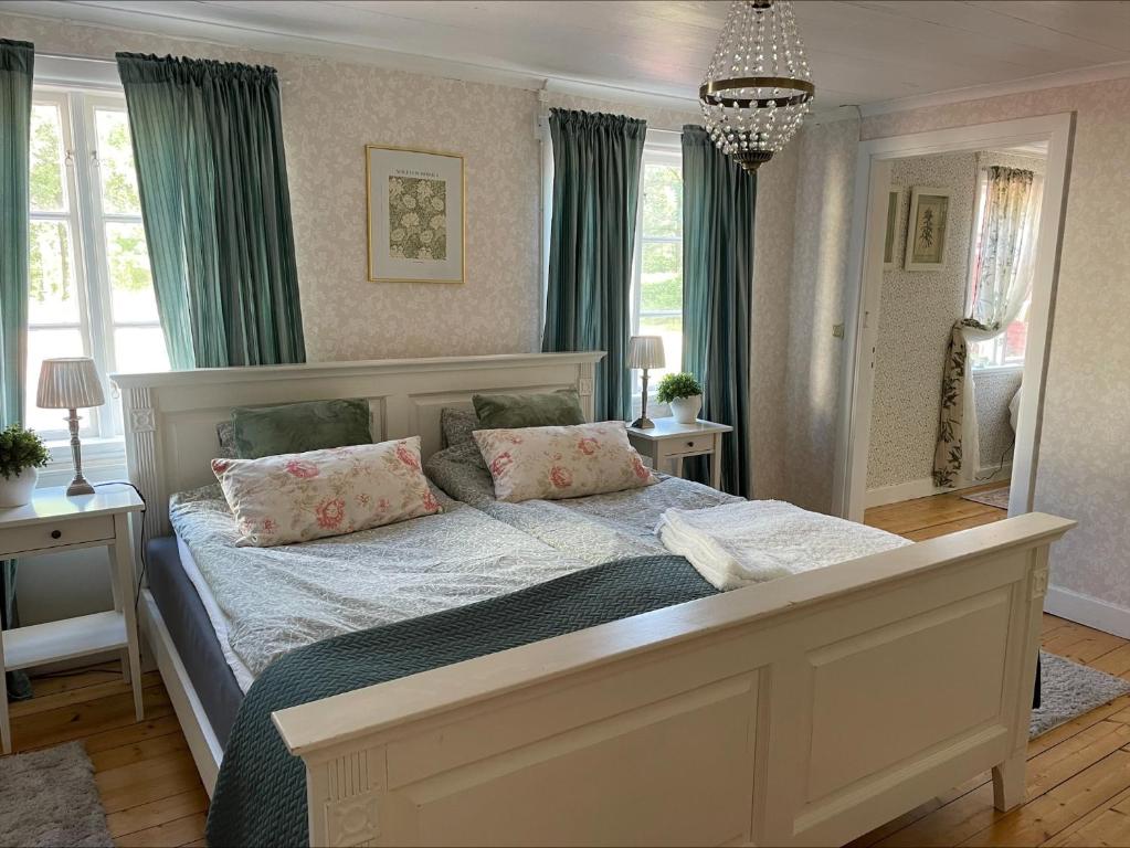 Postel nebo postele na pokoji v ubytování Bärsta Bagarstugan BnB