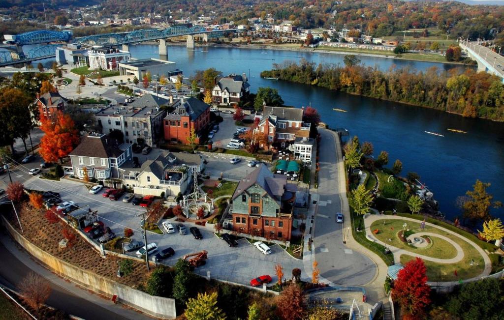 an aerial view of a town next to a river at Hotel Indigo Chattanooga - Downtown by IHG in Chattanooga