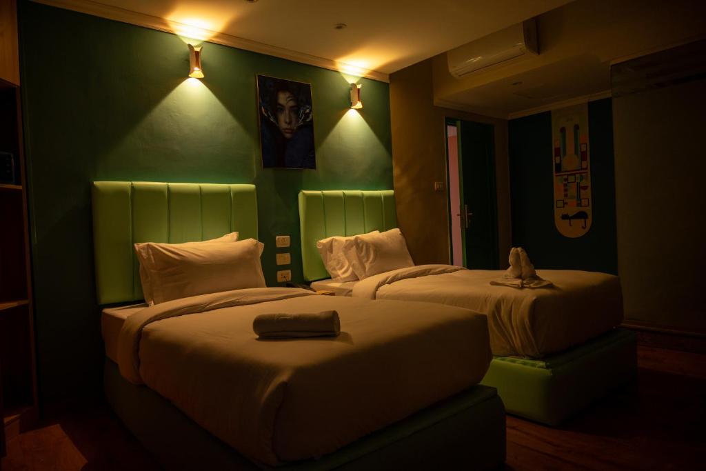 Postel nebo postele na pokoji v ubytování Soft Hotel