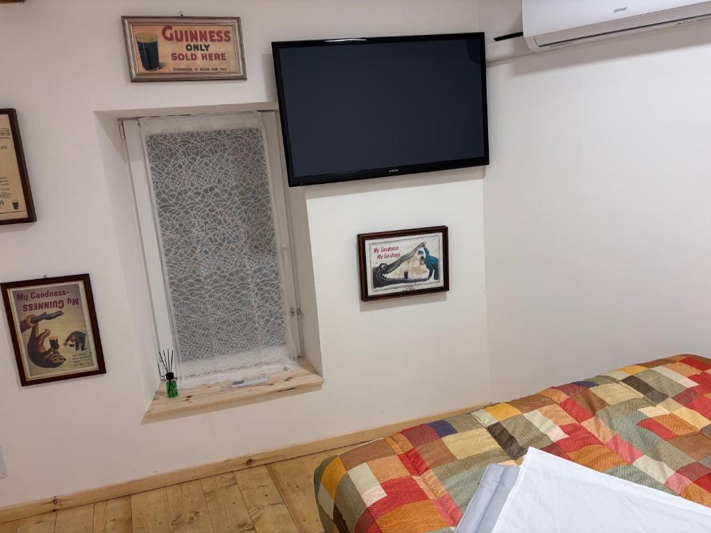 Postel nebo postele na pokoji v ubytování Green appartament