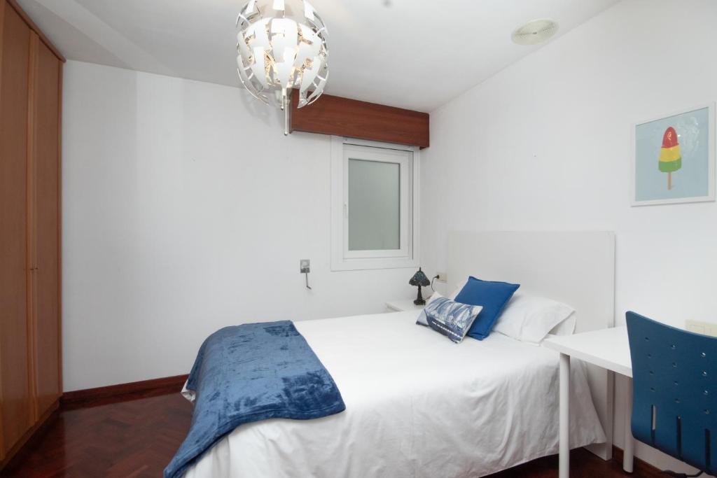 Postel nebo postele na pokoji v ubytování AG Apartamento Nordés Malpica primera línea playa