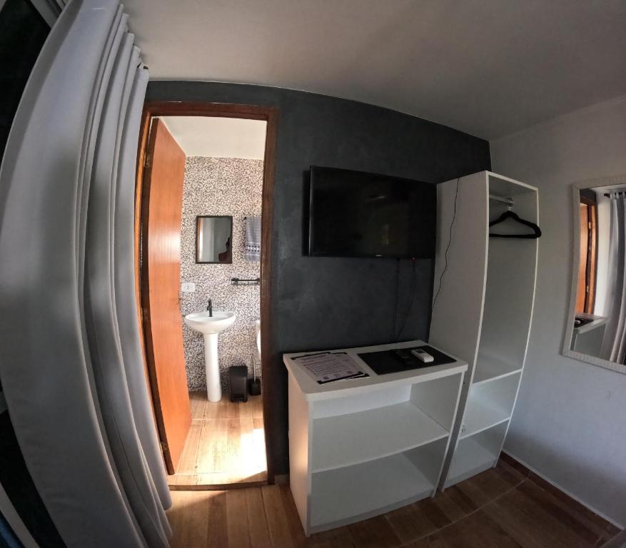 TV a/nebo společenská místnost v ubytování Container Hospedaria Paraty