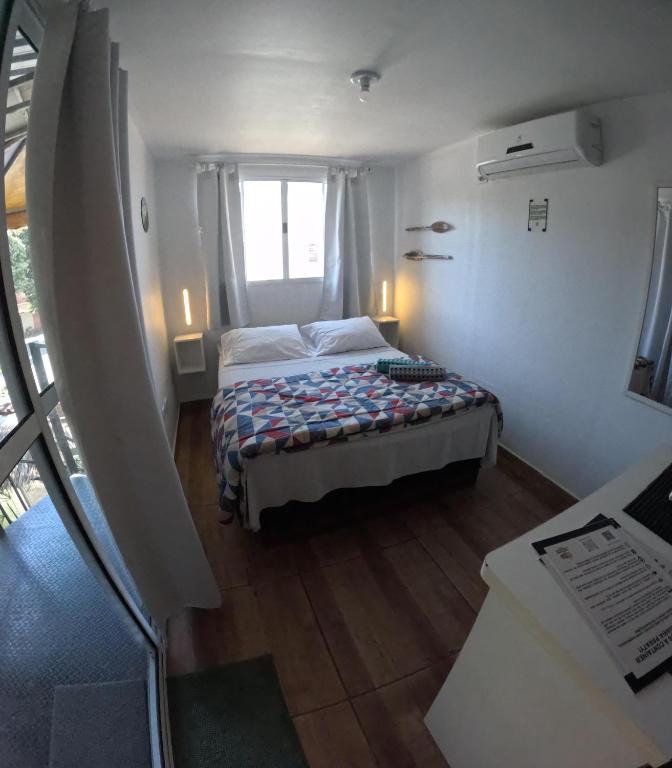 Postel nebo postele na pokoji v ubytování Container Hospedaria Paraty