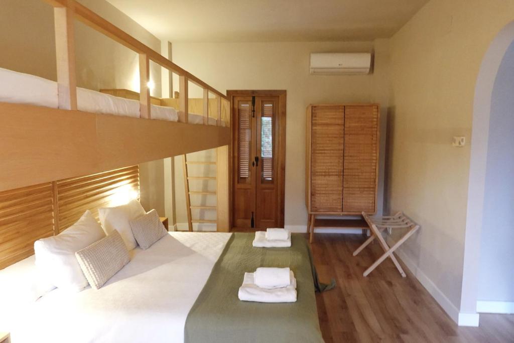 Postel nebo postele na pokoji v ubytování Hotel Taray Botanico