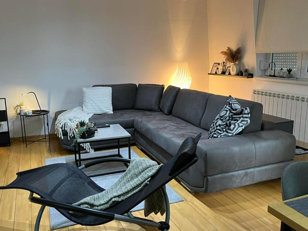 Predel za sedenje v nastanitvi Apartman Riva
