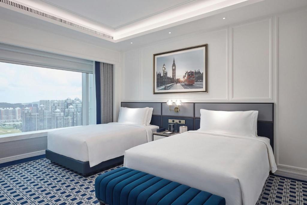 Postel nebo postele na pokoji v ubytování Londoner Grand, a Luxury Collection Hotel, Macau