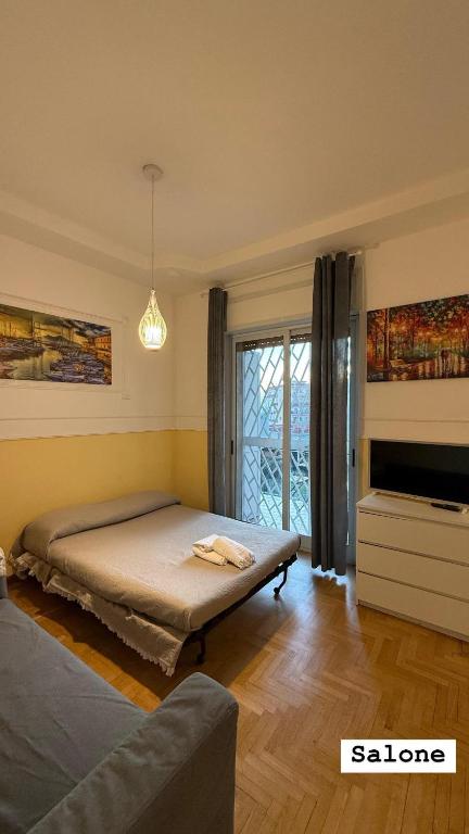 Łóżko lub łóżka w pokoju w obiekcie Amore cuore