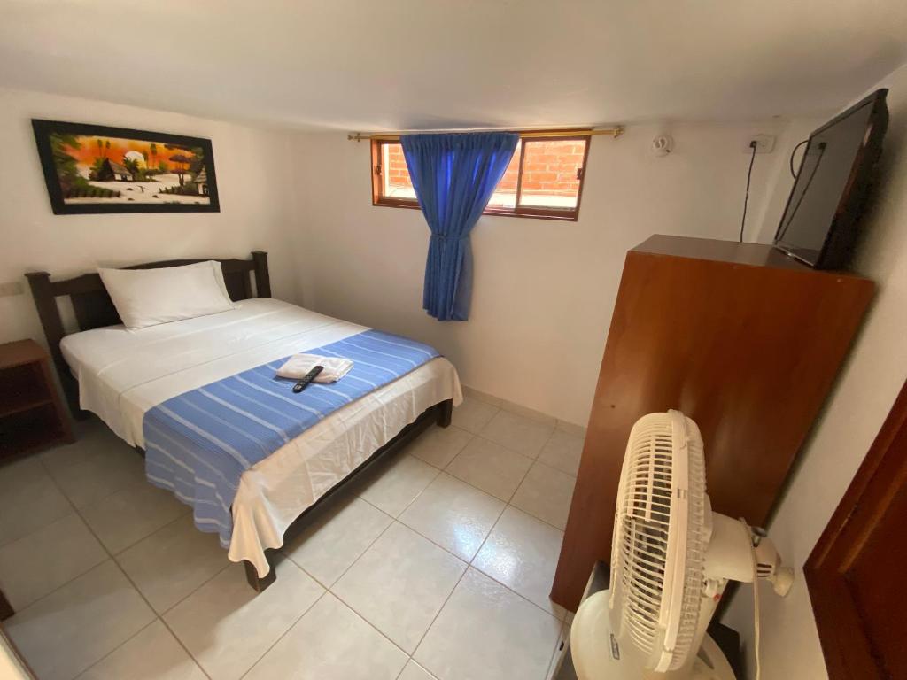Postel nebo postele na pokoji v ubytování Hotel Davilejas