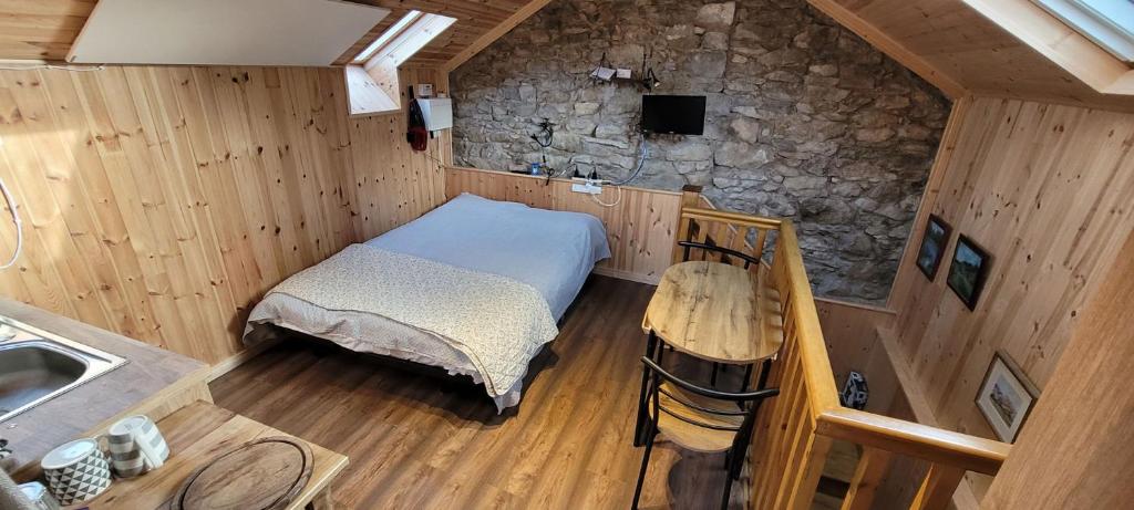 Katil atau katil-katil dalam bilik di Quarvue Loft