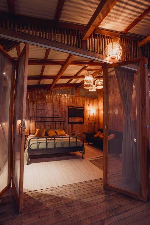Postel nebo postele na pokoji v ubytování BAJO EL CIELO Glamping MINCA
