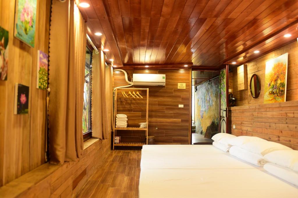 Postel nebo postele na pokoji v ubytování Đồi Gió Retreat