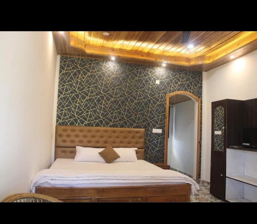 Postel nebo postele na pokoji v ubytování Raina resort