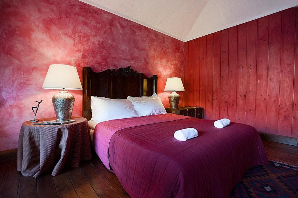 Postel nebo postele na pokoji v ubytování L'Isola Di Rosa - Relais & Hotel di Charme