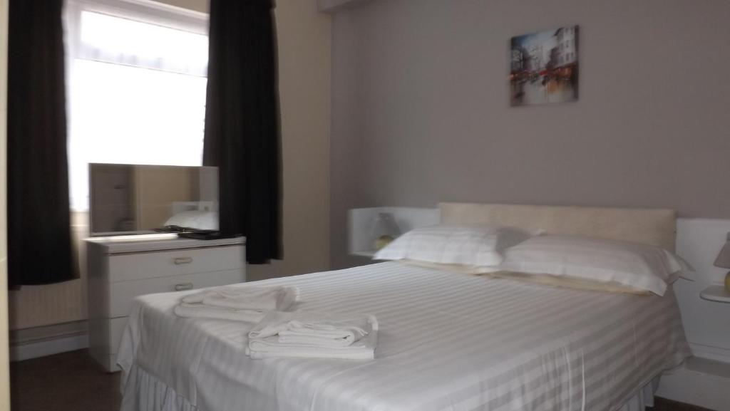 Postel nebo postele na pokoji v ubytování Seawold Guest House