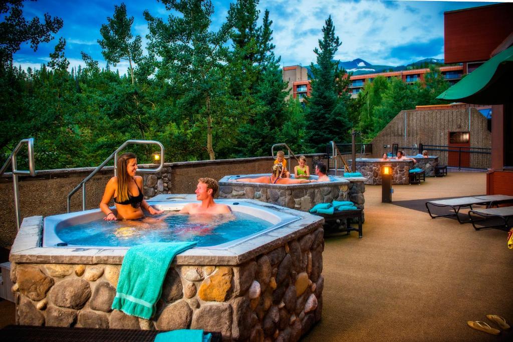 a couple of people in a jacuzzi tub at Beaver Run Resort in Breckenridge