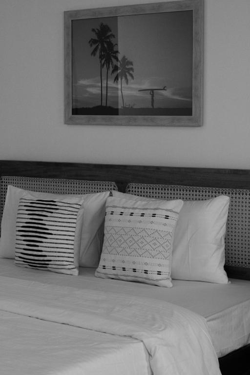 Postel nebo postele na pokoji v ubytování Sansun Guesthouse