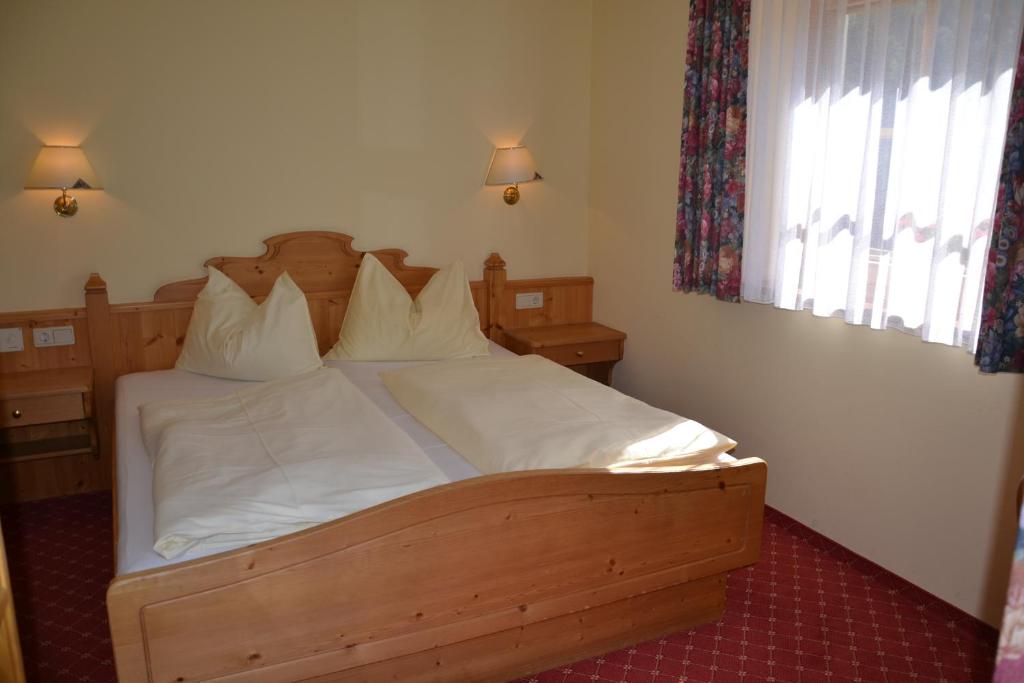 Posteľ alebo postele v izbe v ubytovaní Holiday-Appartements