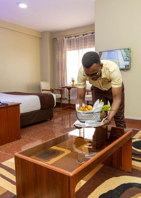 TV a/nebo společenská místnost v ubytování Maxland Hotel