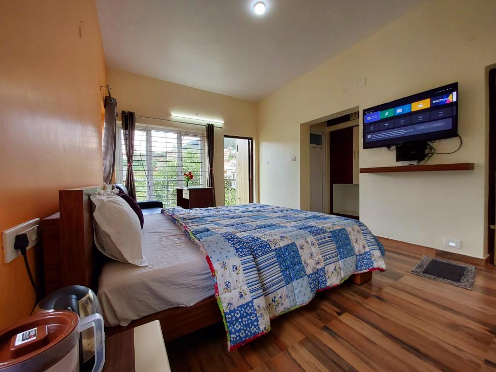 Postel nebo postele na pokoji v ubytování Serenity inn
